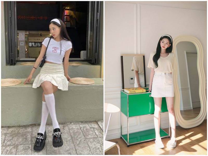 Phối đồ ấn tượng với chân váy trắng.