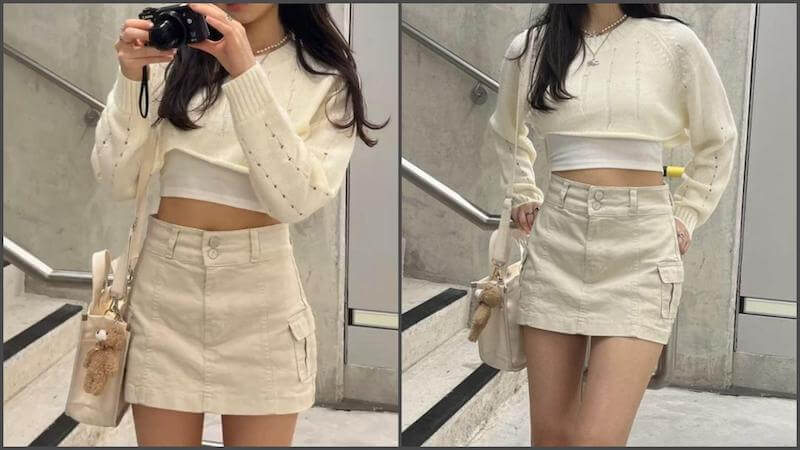 Phối chân váy trắng cùng áo croptop.